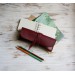 Minimalist burgundy leather wrap pencil pouch