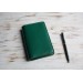 Green leather field notes cover 